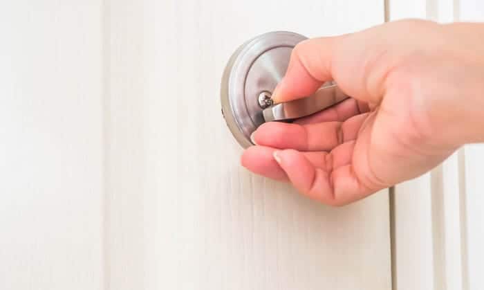 how to lock a pocket door from both sides