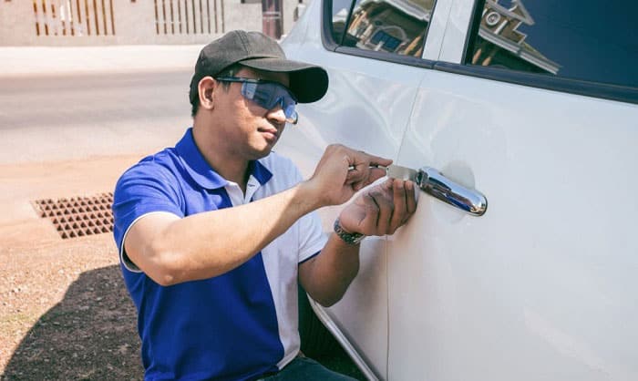 what to do when your car door lock is stuck in locked position