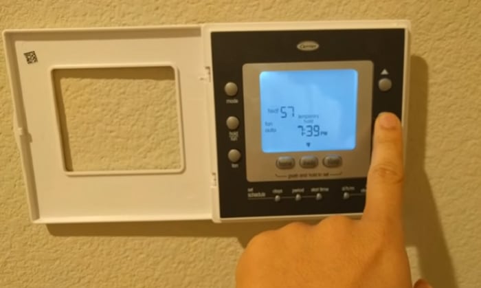 how to unlock carrier thermostat