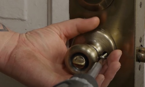 Tighten-the-door-knob’s-screws