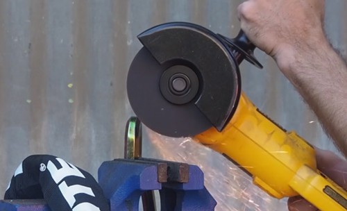Cutting-the-lock-with-angle-grinder