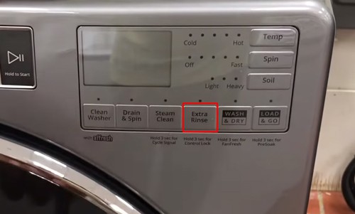 Look-for-the-unlocking-button-of-the-washer